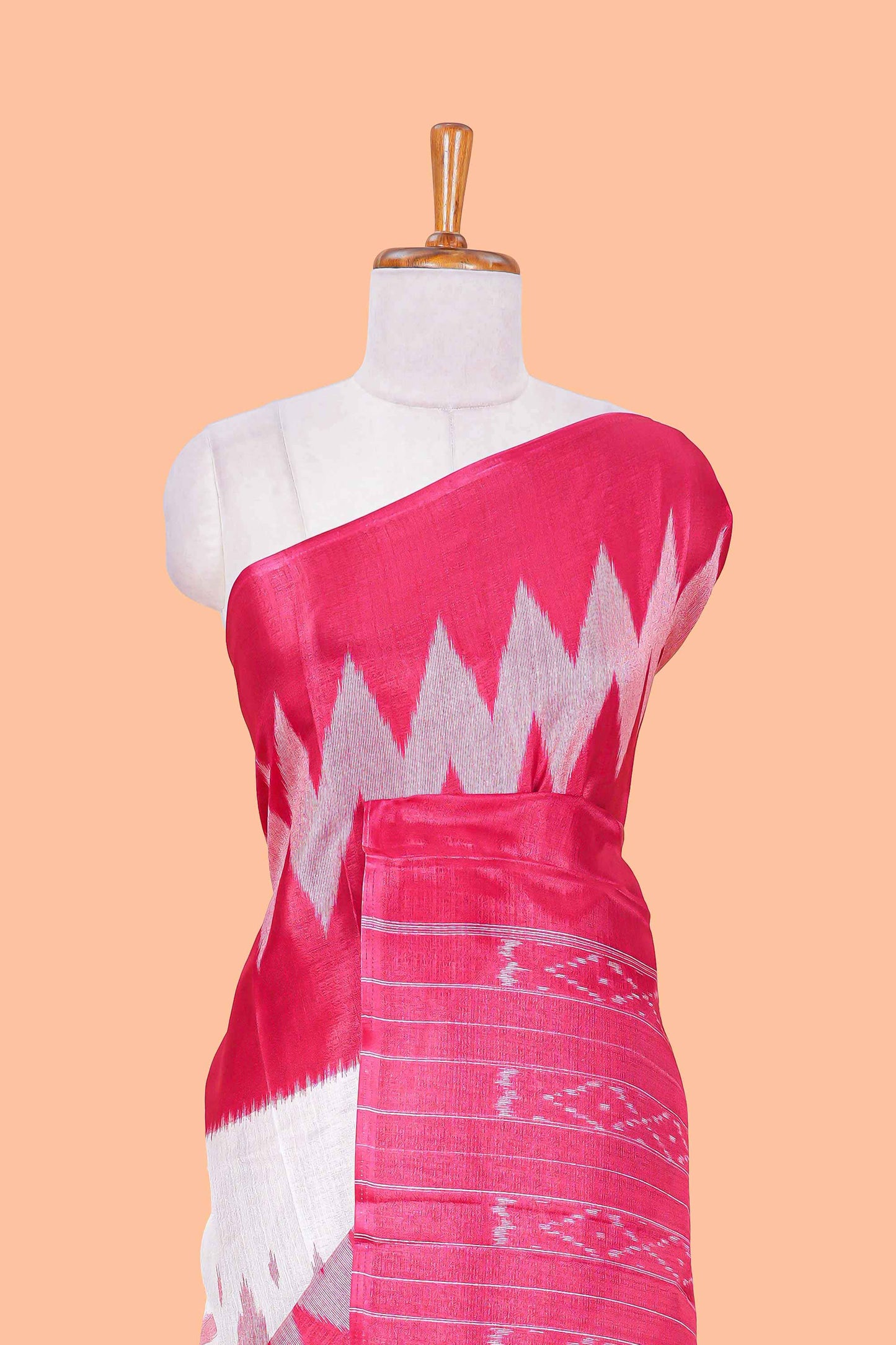 Pink & white geometric ikkat style south cotton saree with striped pallu and blouse