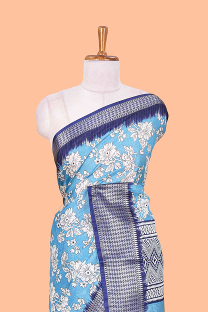 Blue dola silk saree with rico zari work, floral print and elegant jacquard border