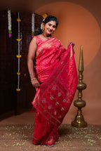 Rani pink bandhani style georgette saree with self stone work design border and pallu