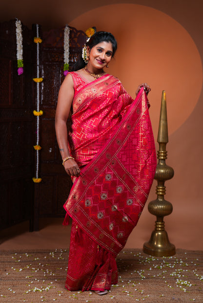 Rani pink bandhani style georgette saree with self stone work design border and pallu