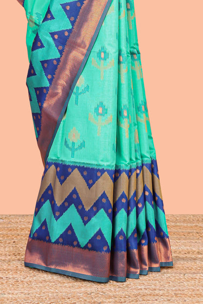 Rama Green Semi Soft Silk Saree Body All Over Ikkat Pochampally Thread Weaving and Chevron Pattern Border With Ikkat Rich Pallu