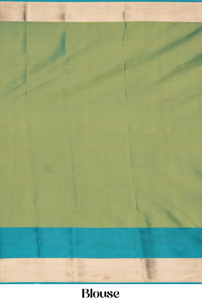 Green blouse with a blue border kathan silk saree