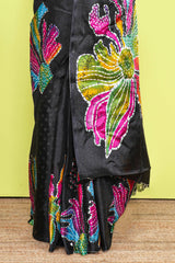 Black south cotton Saree With Multi Color Orchid Printed Across The Body Along With White Dotted Blouse