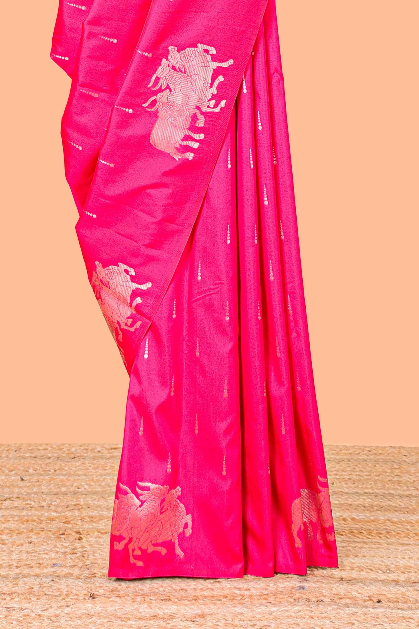 Pink Semi Soft Silk Saree Body Rain Drop Butti and Border Nandhi Motifs and Grand Zari Rich Pallu