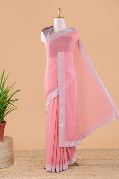 Pink designer georgette space silk saree with heavy stone & beads work, short pallu and contrast sequin embroidered blouse