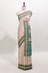 Tussar saree in beige tone delicate floral embroidery featuring dark green borders and woven pallu along with contrast blouse