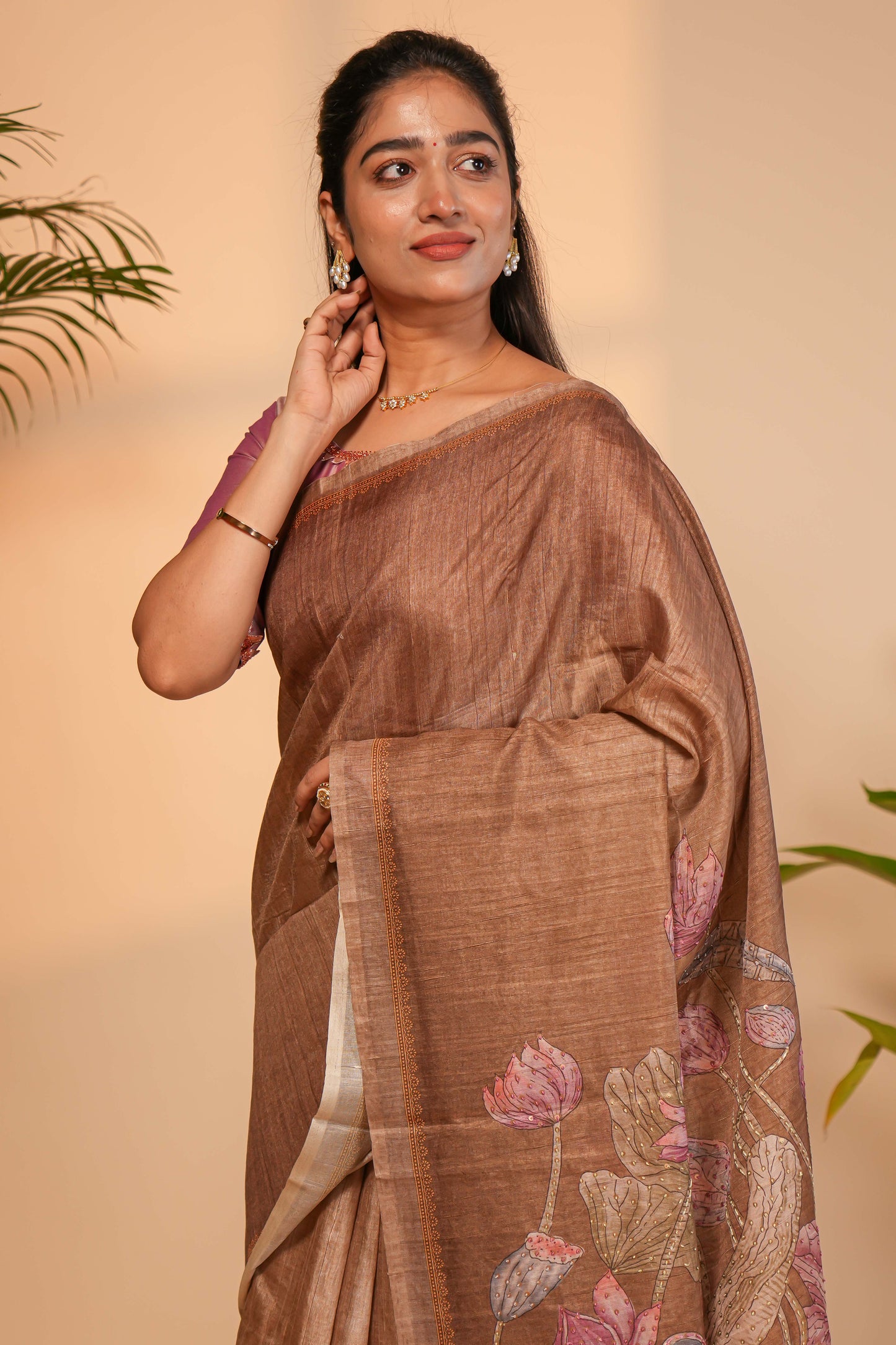 Brown floral design semi tussar saree with self border and matching printed blouse
