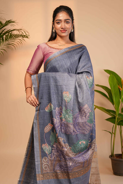 Green floral design semi tussar saree with self border and matching printed blouse