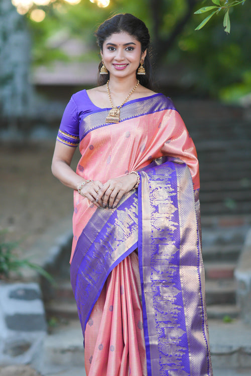 Orange geometric checked  floral motifs design with contrast palak zari design border and blouse