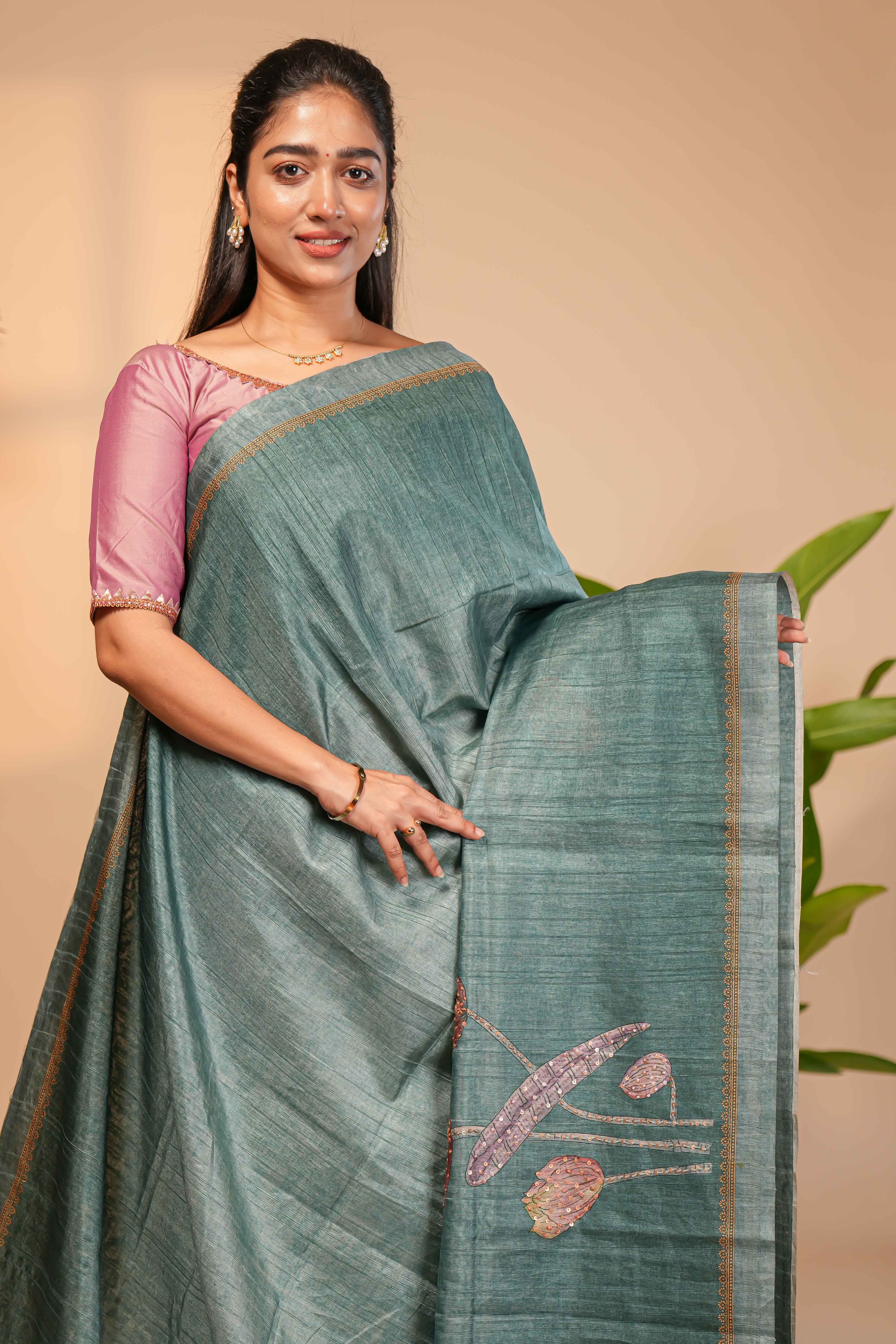 Green floral design semi tussar saree with self border and matching printed blouse