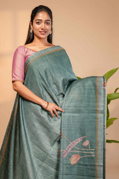 Green floral design semi tussar saree with self border and matching printed blouse