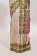 Tussar saree in beige tone delicate floral embroidery featuring green borders and woven pallu along with contrast blouse