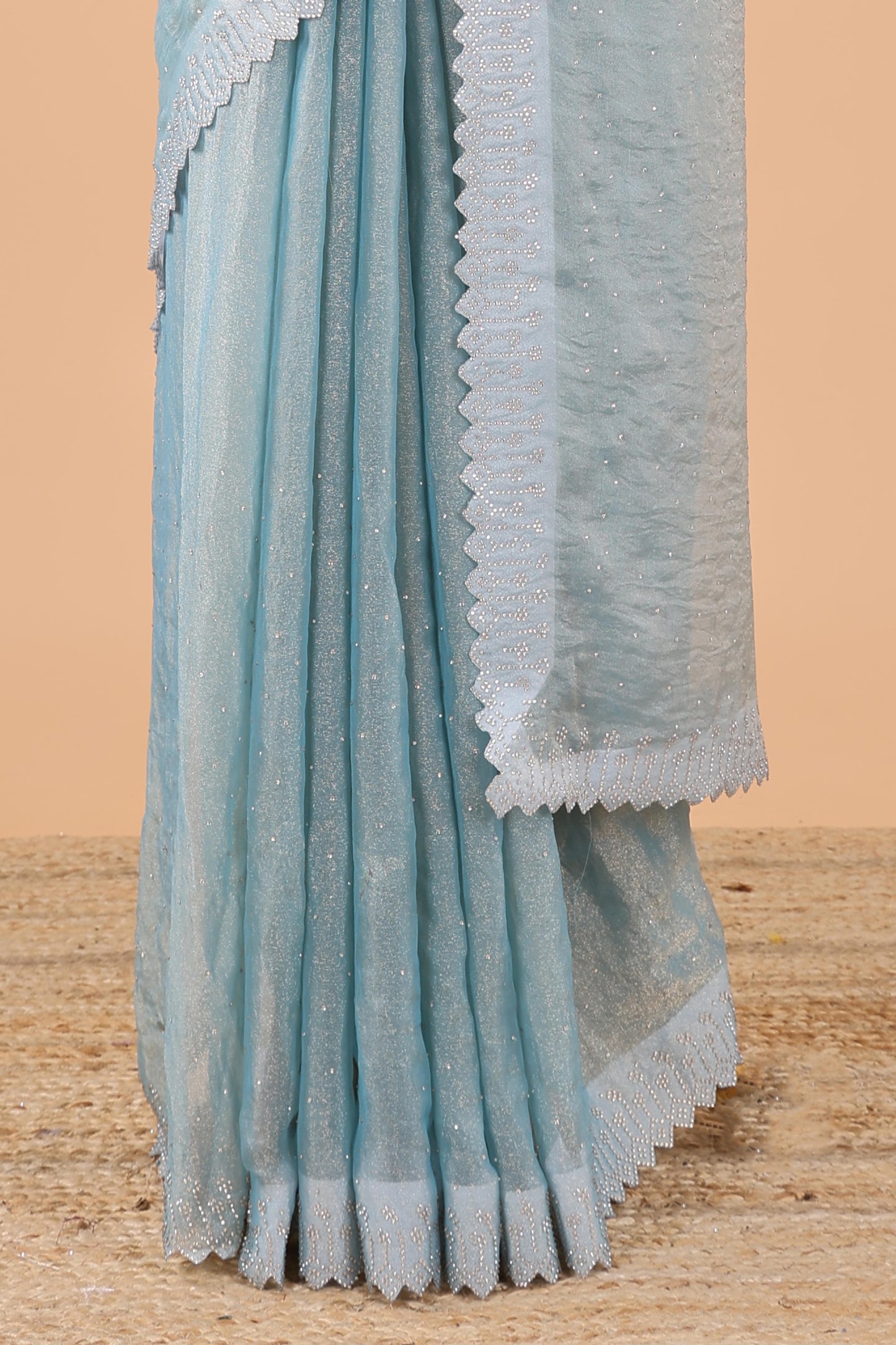 Blue designer georgette space silk saree with heavy stone & beads work, short pallu and contrast sequin embroidered blouse