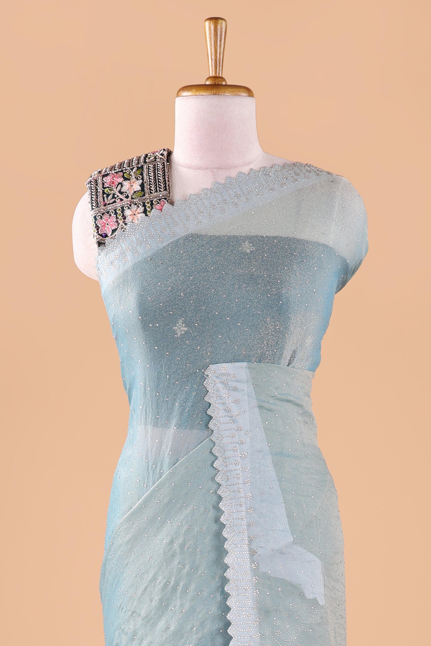 Blue designer georgette space silk saree with heavy stone & beads work, short pallu and contrast sequin embroidered blouse