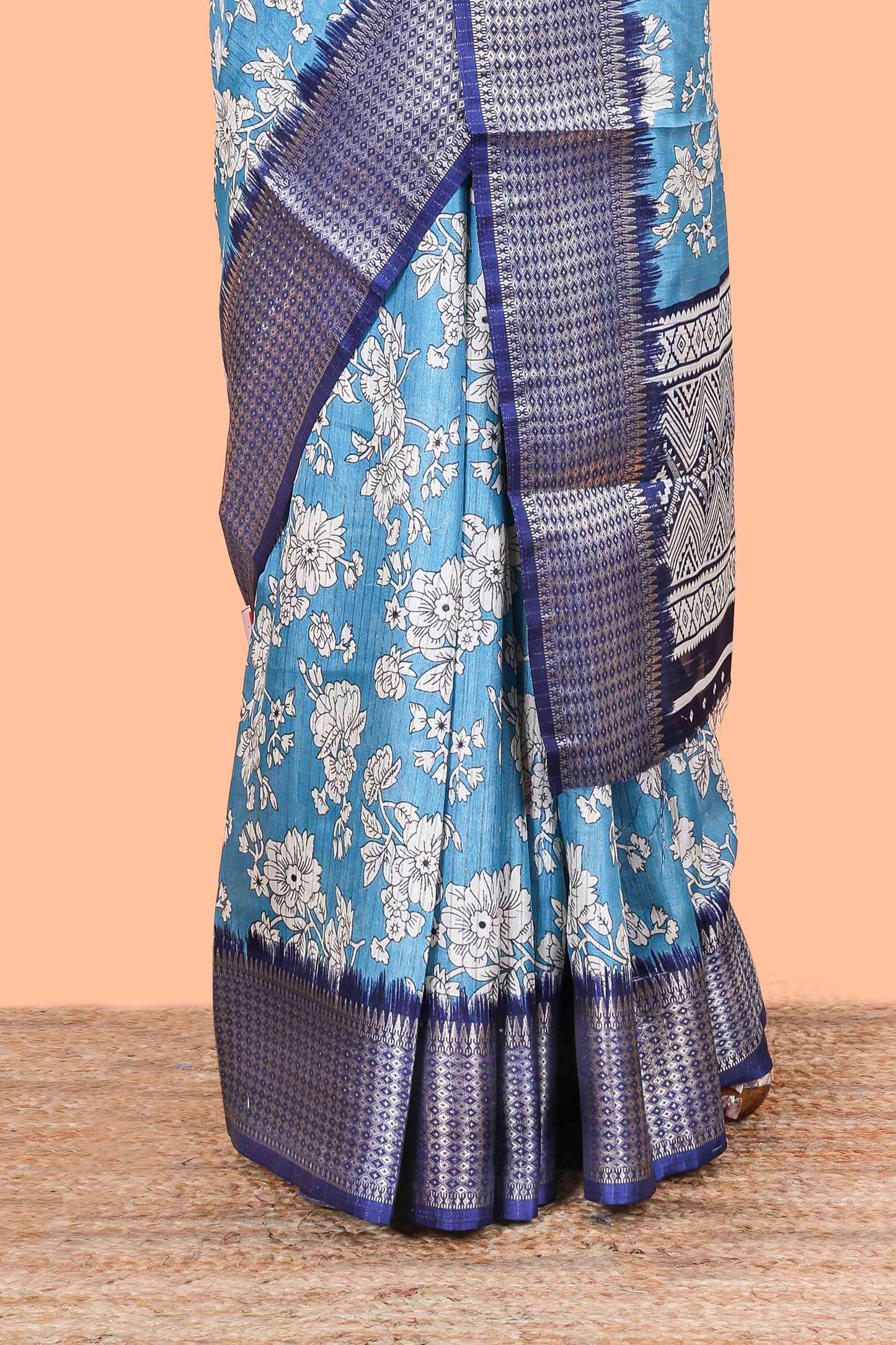 Blue dola silk saree with rico zari work, floral print and elegant jacquard border