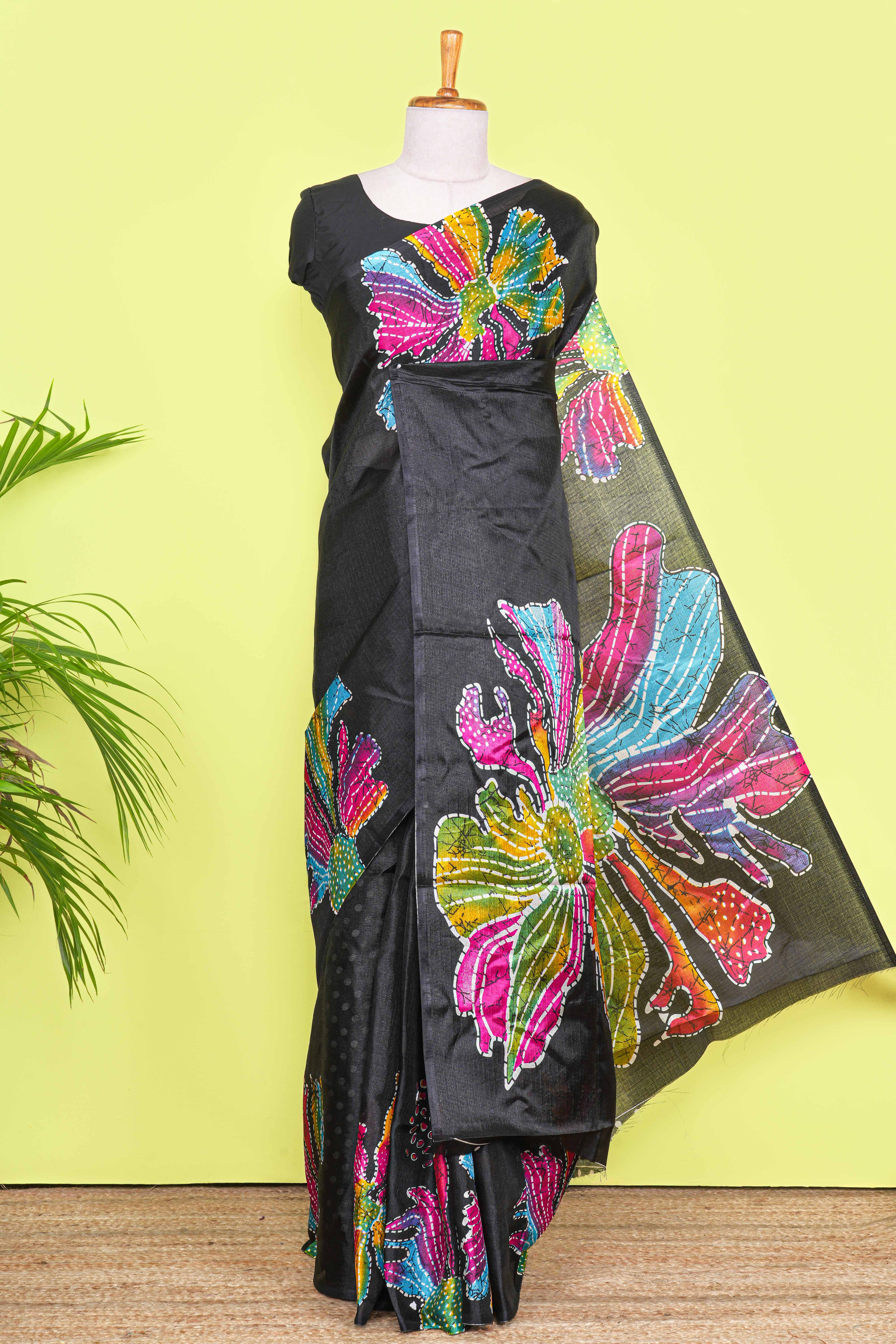 Black south cotton Saree With Multi Color Orchid Printed Across The Body Along With White Dotted Blouse