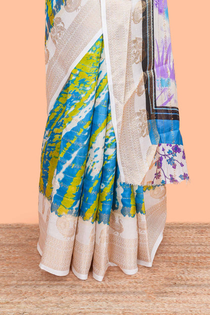 dolo silk saree with tie and dye abstract print all over body with kanchipuram border and rajastani village art pallu and floral print blouse