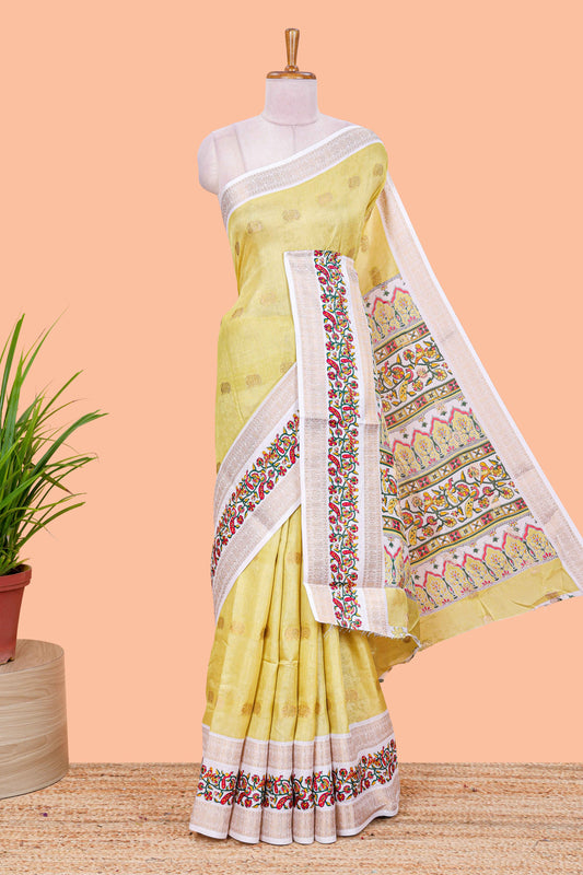 Yellow peacock zari butta dola silk saree with contrast floral vine border and printed blouse