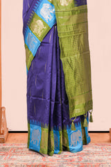 Navy Blue Semi Art Silk Saree Detailing Zari Butta And Border Are Highlight Contrast Color With IntricateZari Woven Elephant, Peacock Motifs With Golden Zari Weaving Pallu