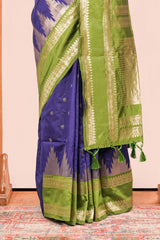 Blue Semi Art Silk Saree Delicate Golden Zari Motifs Along With Thalampoo Zari Woven Across The Body. The Border Is Broad With Intricate FloralZari Weaving Rich Golden Zari Pallu