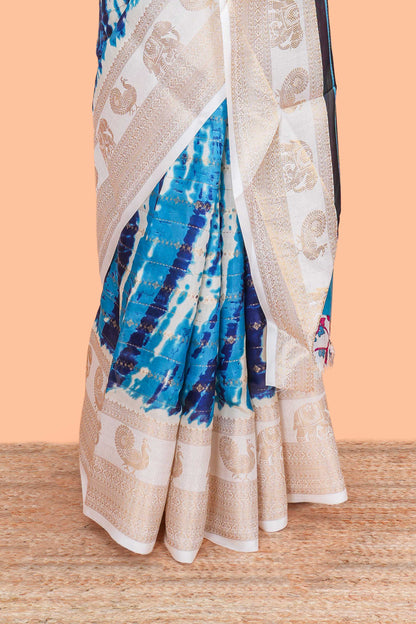 dolo silk saree with tie and dye abstract print all over body with kanchipuram border and rajastani village art pallu and floral print blouse