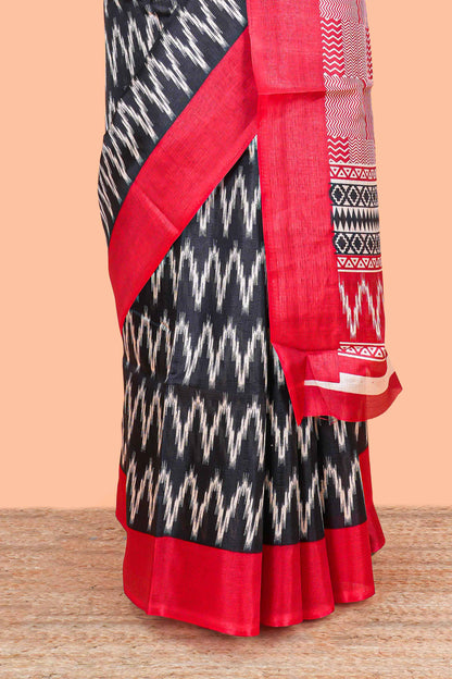 Black ikkat style chevron print south cotton saree with contrast border and blouse