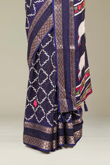 Navy Blue Dola Silk Saree Jaali Design ,Pink Lotus Motifs Across The Body With Gold Zari Bentex BorderPichwai Design Pallu Along With Blouse