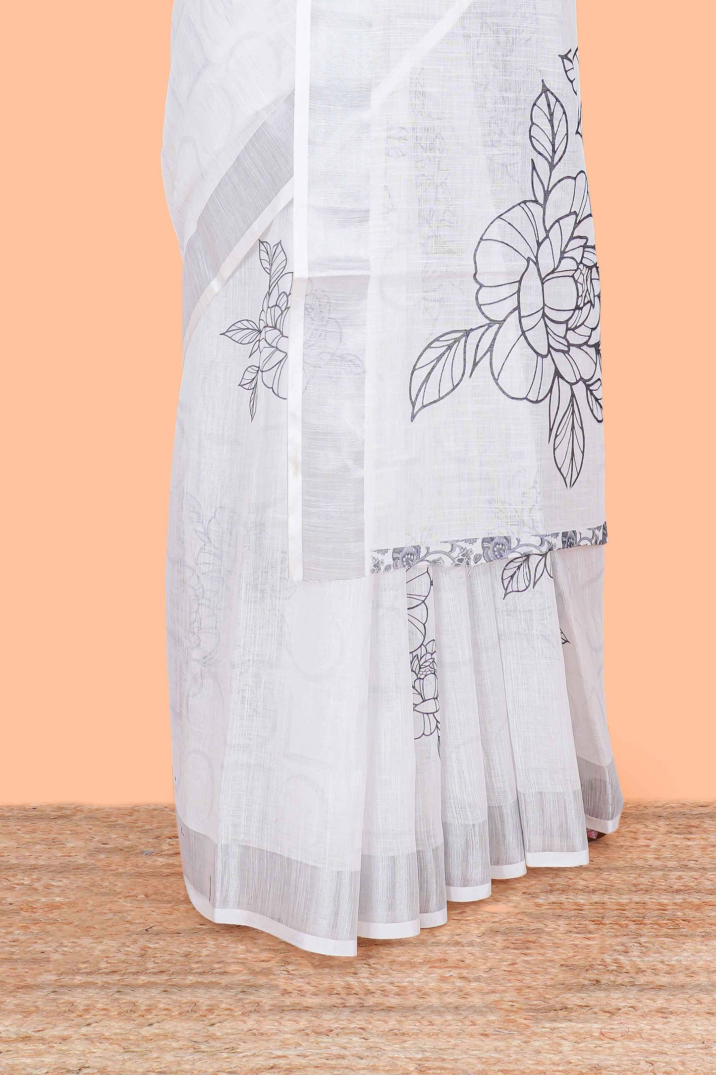 White floral design linen cotton saree with self silver zari border printed blouse