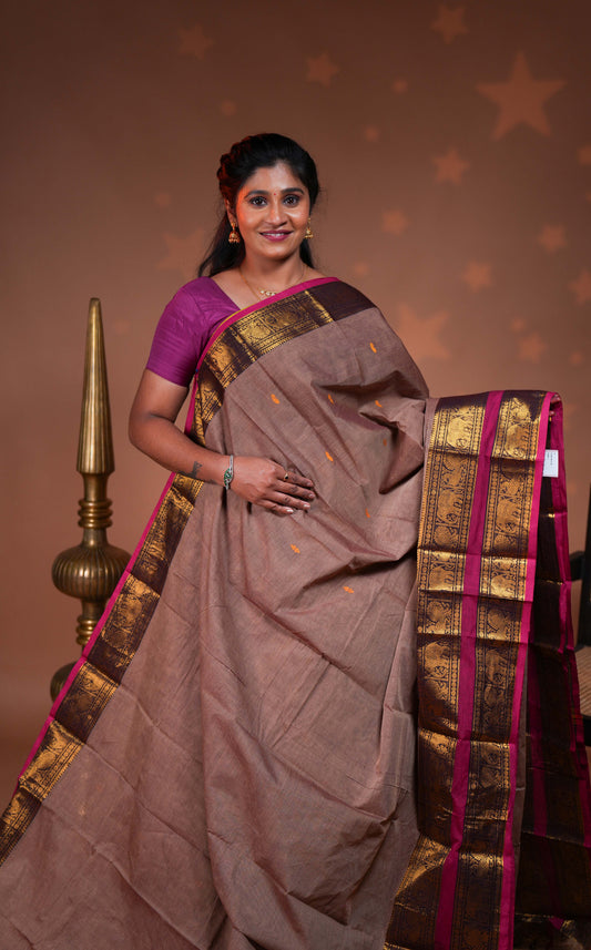 Sand plain chettinad cotton saree with contrast bentex zari border and floral motifs pallu