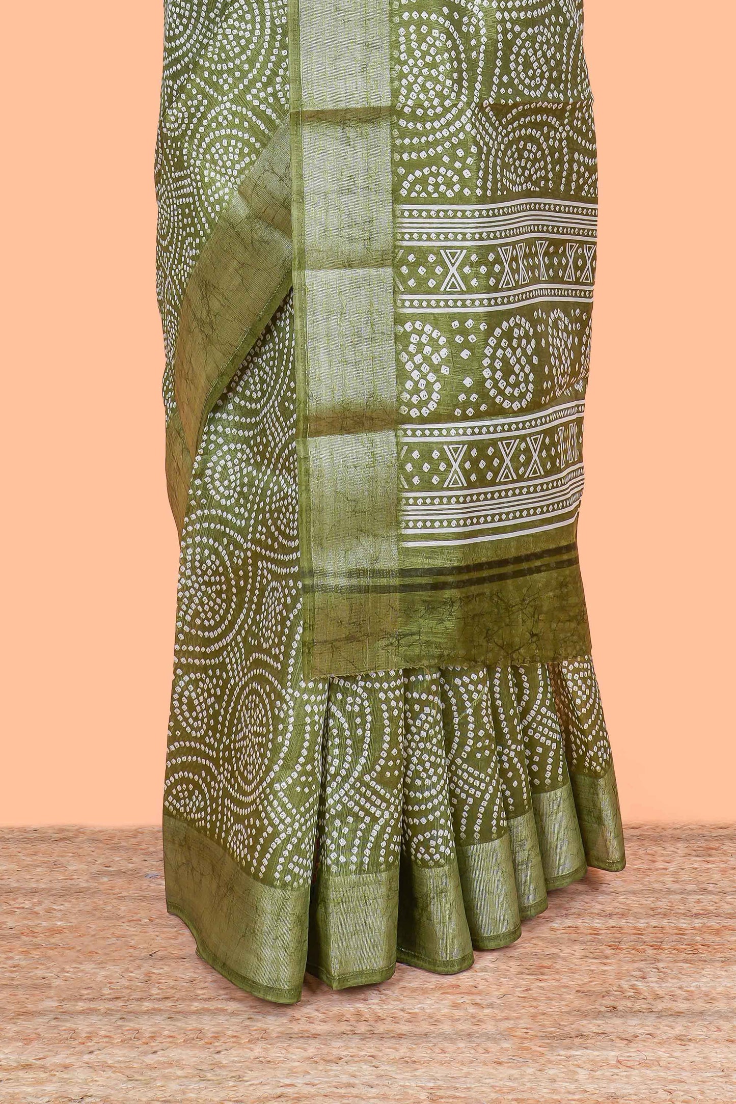 Green south cotton saree with bandhini print body & pallu and silver bawanchi border