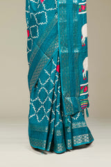 Rama Green Dola Silk Saree Jaali Design ,Pink Lotus Motifs Across The Body With Gold Zari Bentex Border Pichwai Design Pallu Along With Blouse