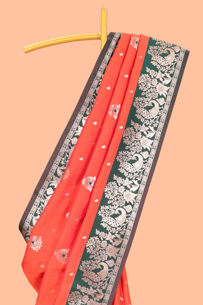 Orange Semi Soft Silk Saree Body All Over Small Gold Zari Butta And Zari Border With Grand Zari Rich Pallu