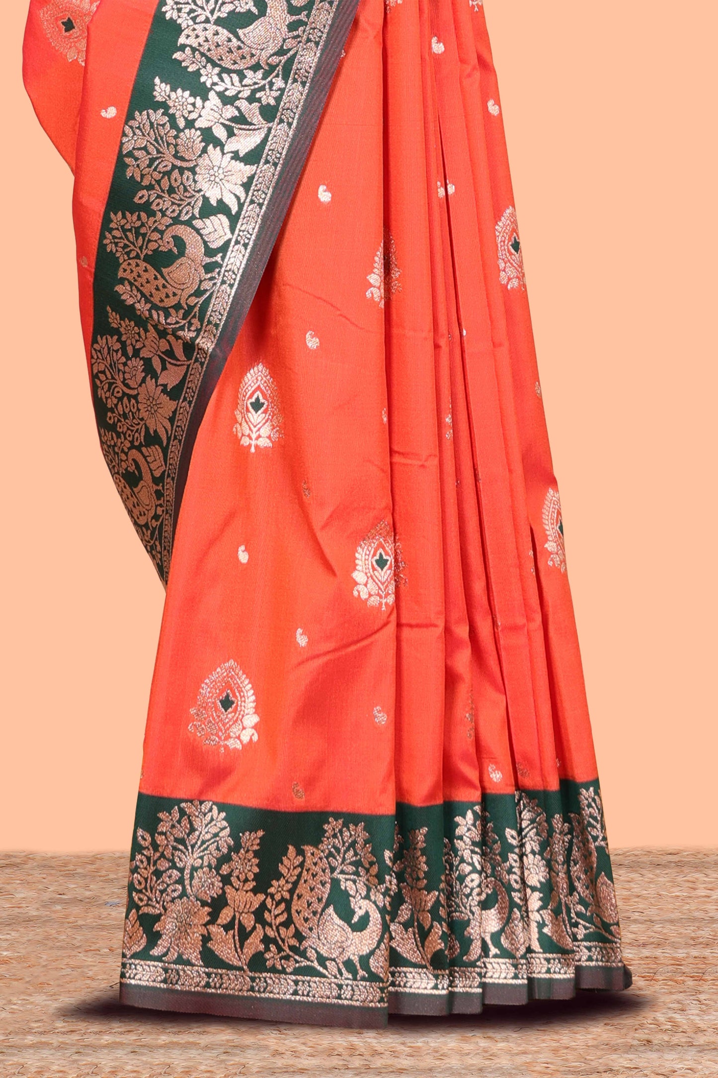 Orange Semi Soft Silk Saree Body All Over Small Gold Zari Butta And Zari Border With Grand Zari Rich Pallu