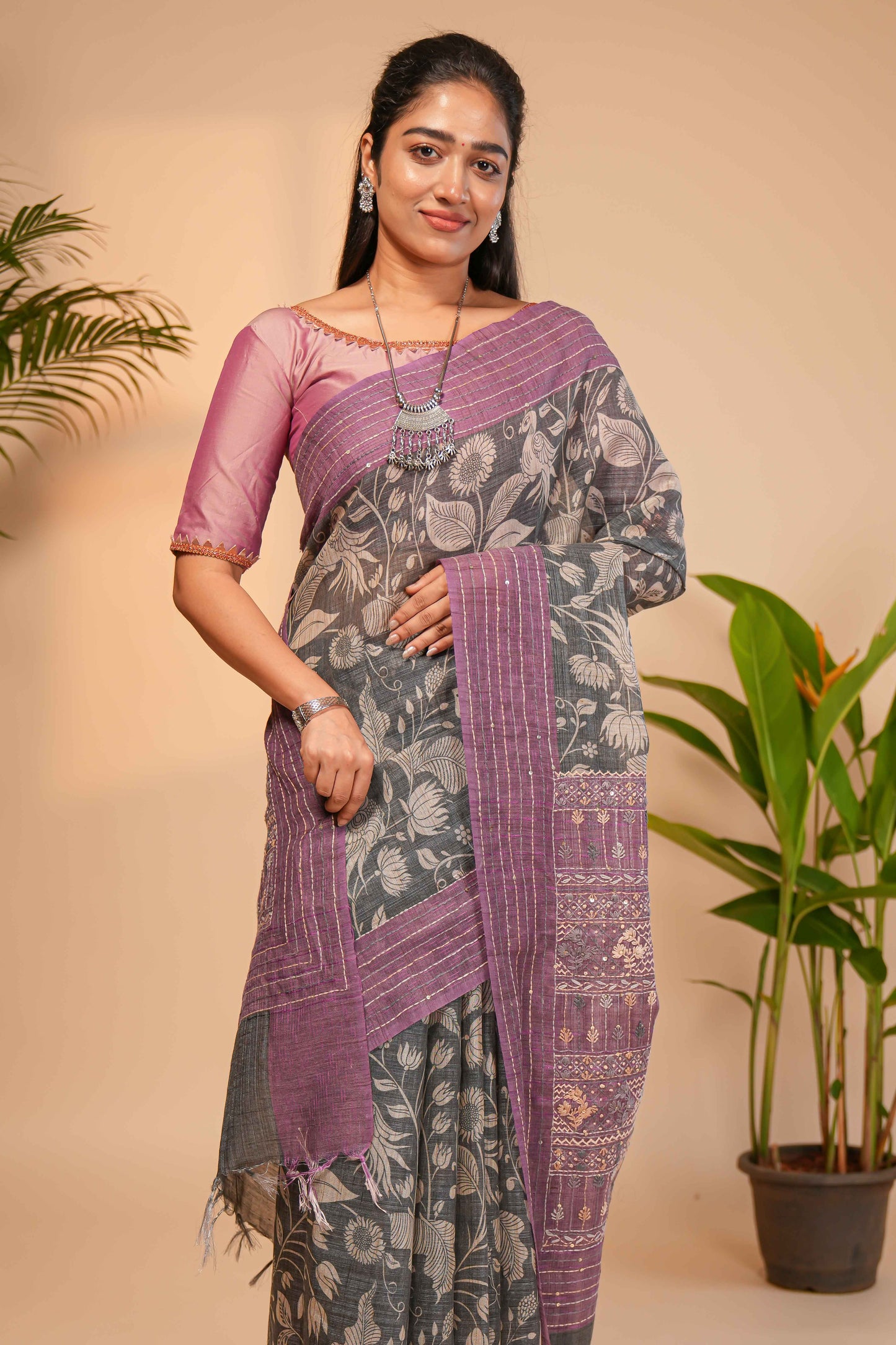 Grey floral design semi tussar saree with contrast lavender border and printed pallu