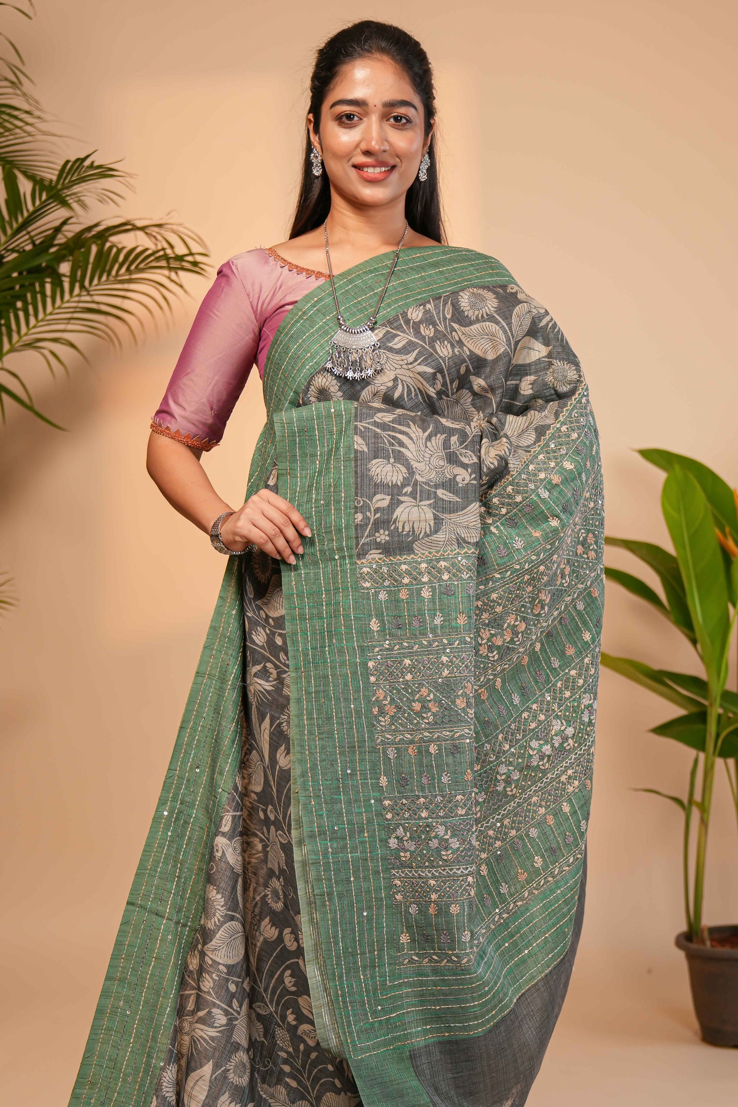 Grey floral design semi tussar saree with contrast green border and printed pallu