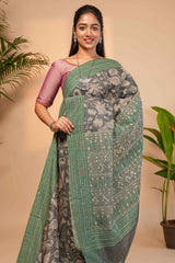 Grey floral design semi tussar saree with contrast green border and printed pallu