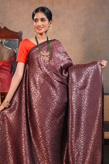 Deep Wine Semi Soft Silk Saree with intricate gold zari floral vine weaving patterns and Rich zari woven pallu with Matching blouse