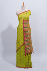 Green checked south cotton saree with contrast border and ikkat style pallu