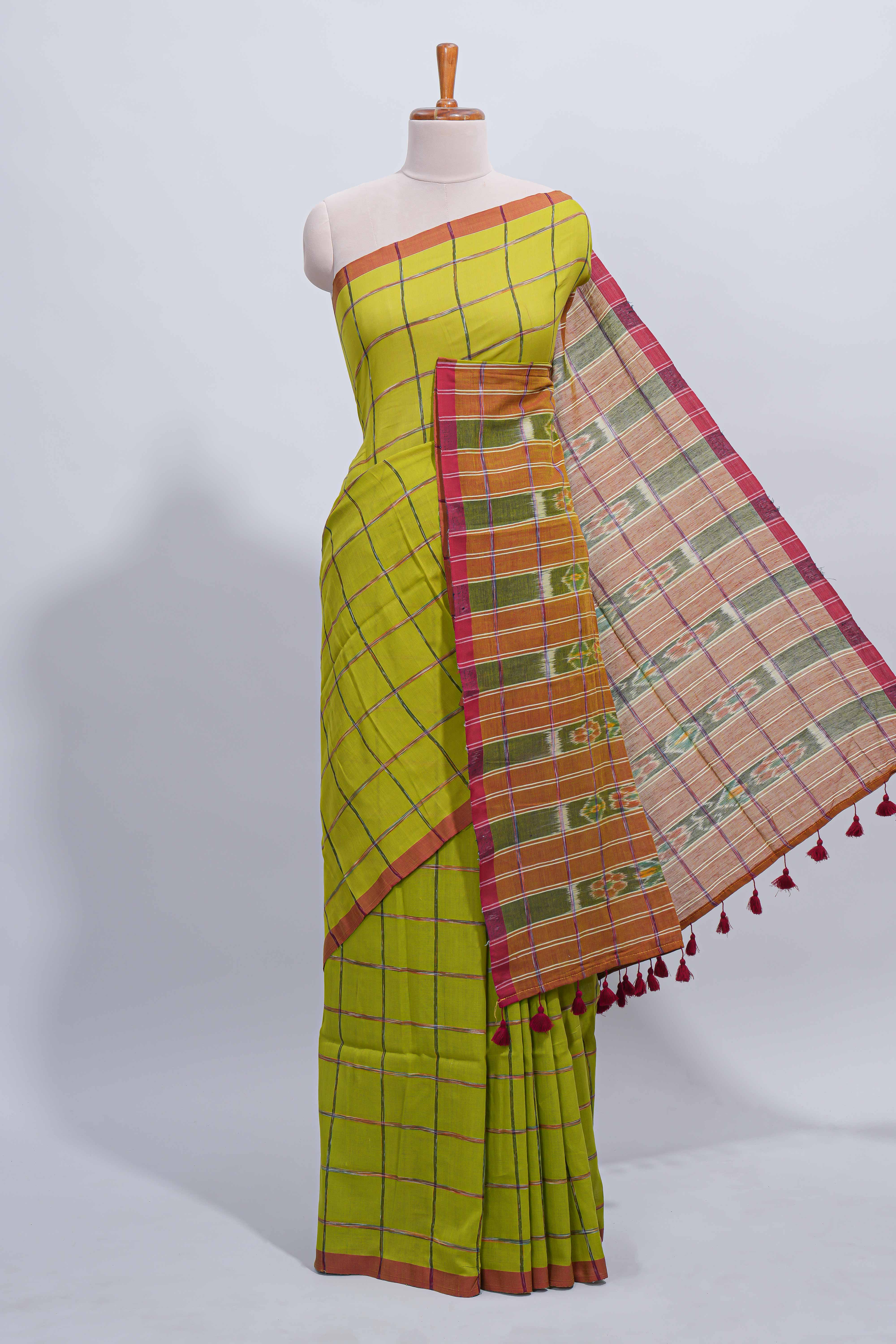 Green checked south cotton saree with contrast border and ikkat style pallu