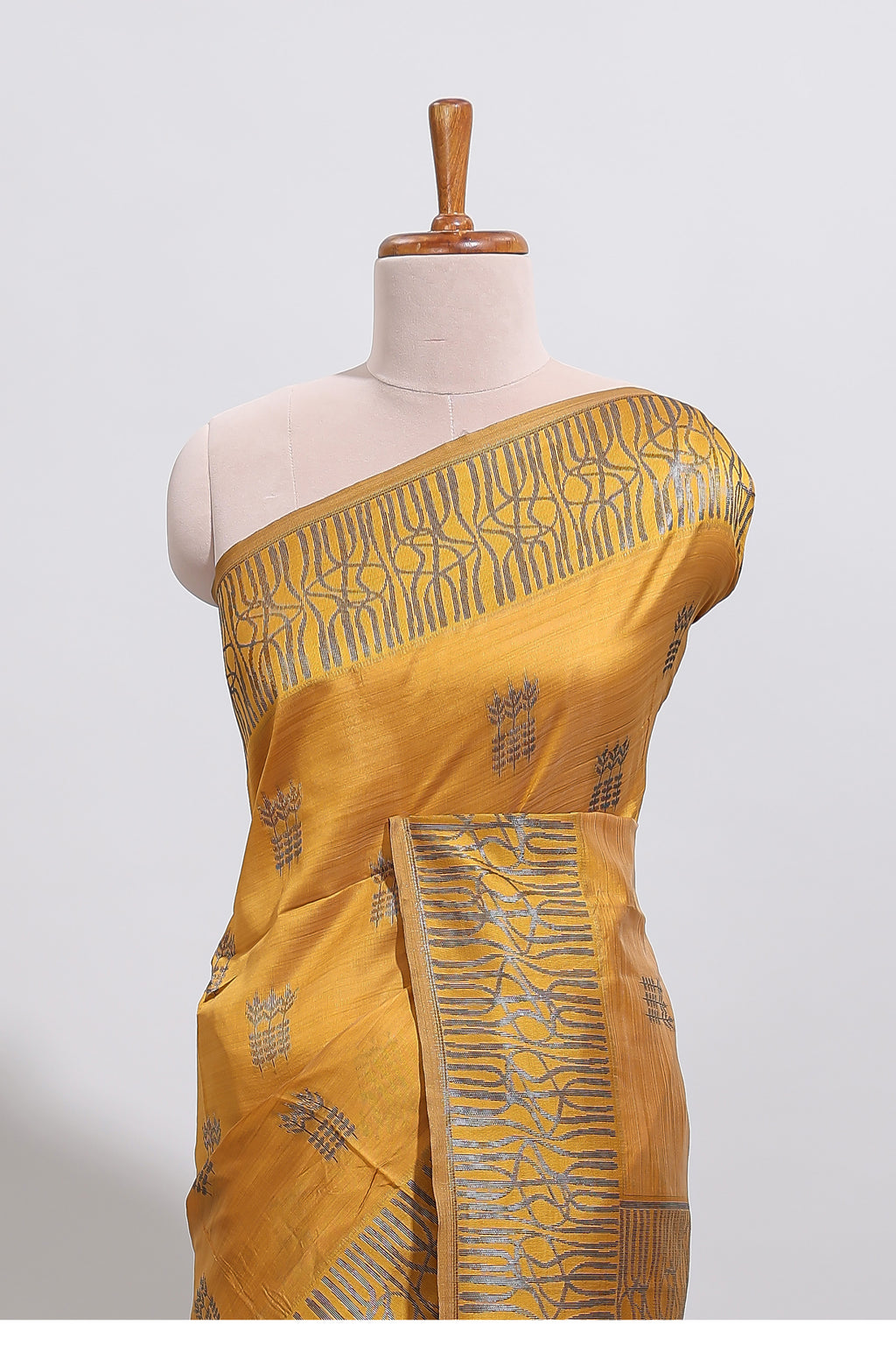 Mustard floral zari motifs design tussar saree with self border matching blouse