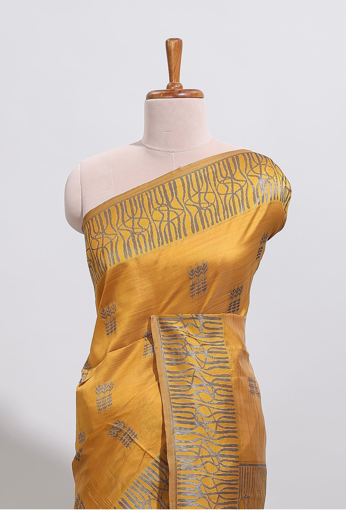 Mustard floral zari motifs design tussar saree with self border matching blouse