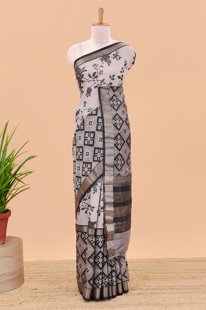 Grey checked chanderi cotton saree with floral design, contrast geomentric zari border