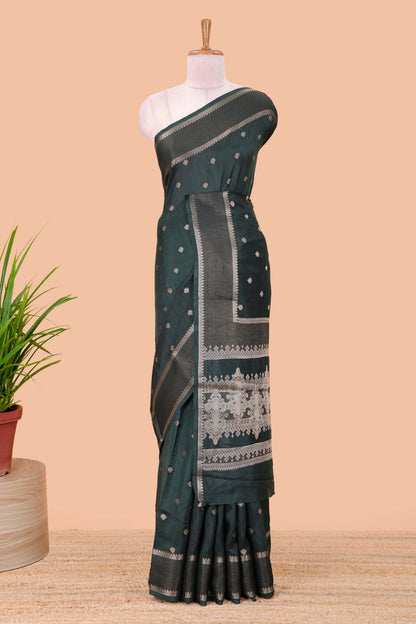 Green dola silk saree with all over zari butta, bendex zari border, rich zari pallu and contrast blouse