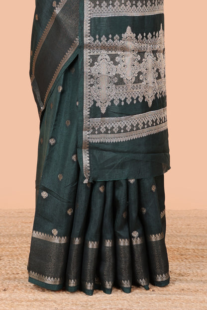 Green dola silk saree with all over zari butta, bendex zari border, rich zari pallu and contrast blouse