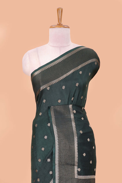 Green dola silk saree with all over zari butta, bendex zari border, rich zari pallu and contrast blouse