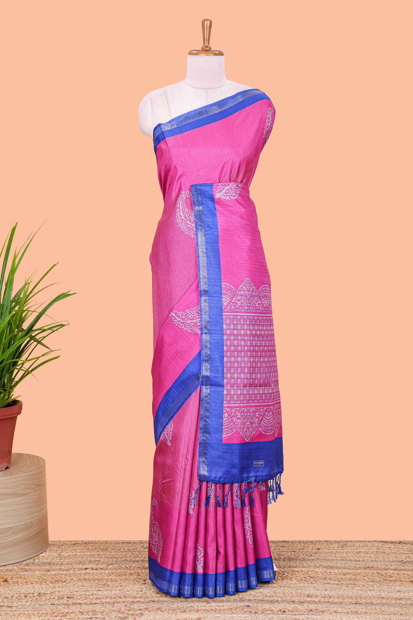 Pink striped floral butta art tussar saree with contrast zari border and matching pallu