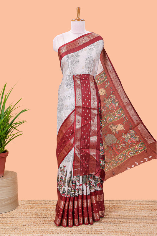 White Kalamkari style floral and crane birds print marsh georgette saree with red zari border and printed pallu