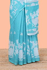 Turquoise green linen cotton floral and birds print saree with self border and matching printed blouse