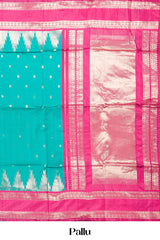 Rama Green Semi Art Silk Saree Delicate Golden Zari Motifs Along With Thalampoo Zari Woven Across The Body. The Border Is Broad With Intricate Floral Zari Weaving Rich Golden Zari Pallu