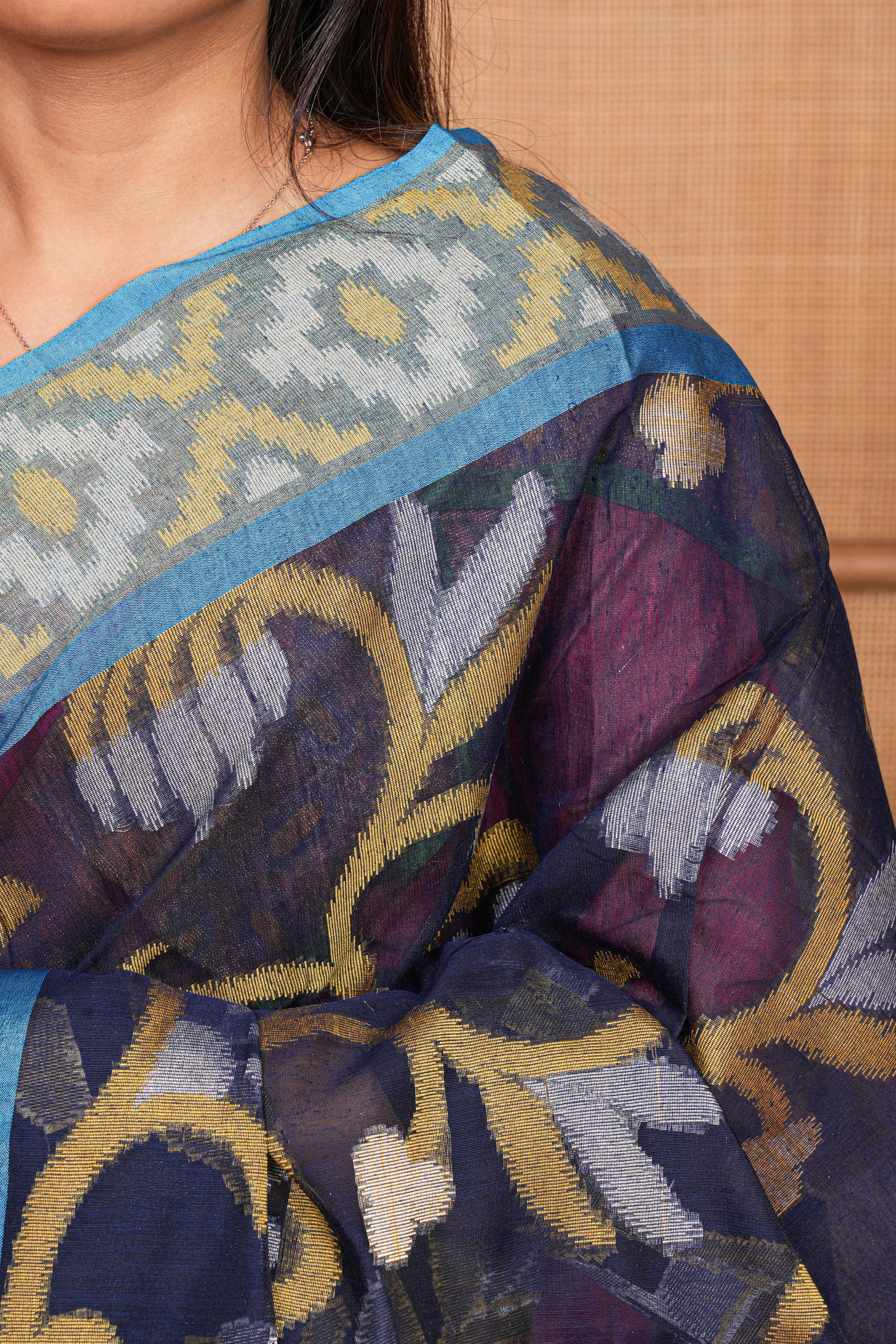  Chanderi Cotton Saree with intricate patterns draped over a person 
